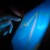 Hand interacting with a blue screen showing an abstract line graphic